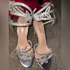 Silver butterfly heels